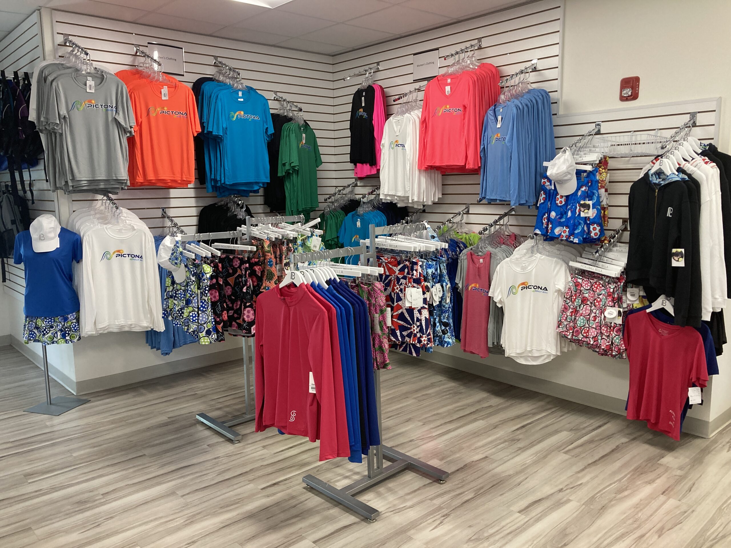 Player shop with pickleball equipment and merchandise