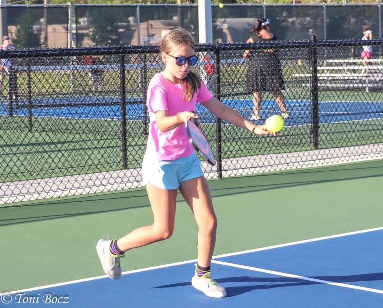 Child Learning Pickleball